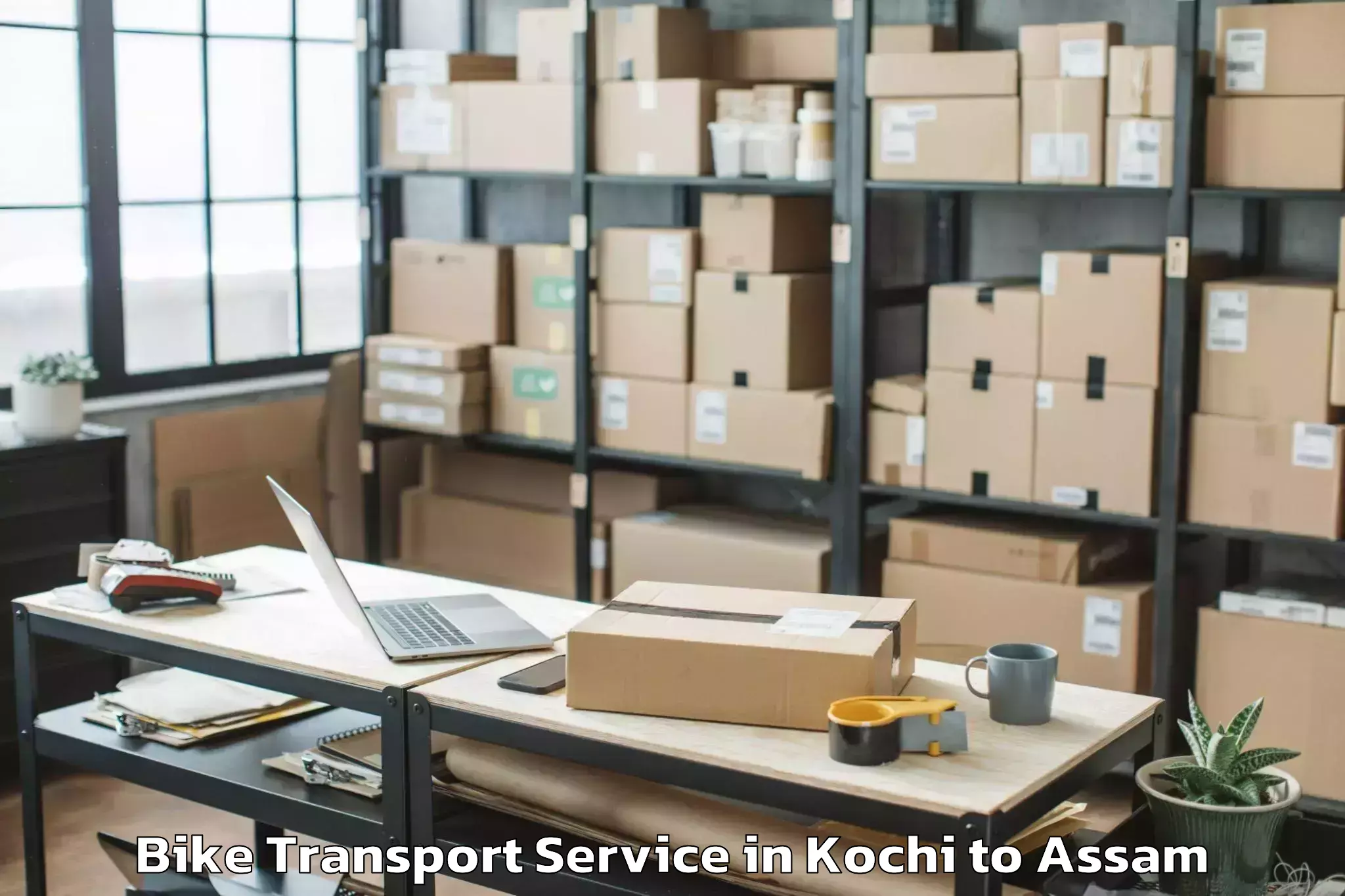 Book Kochi to Borjhar Airport Gau Bike Transport Online